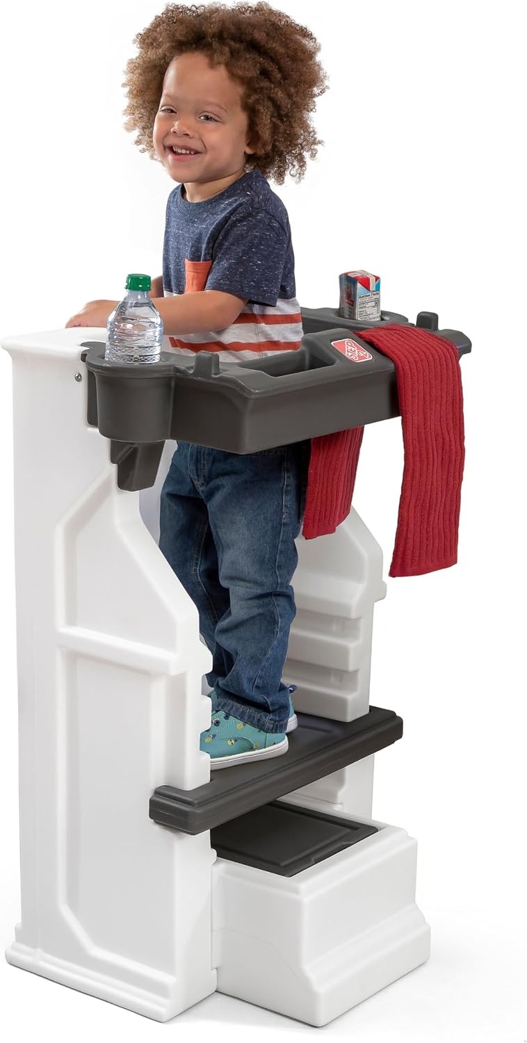 image:imageStep2 Mobile Helper Toddler Step Stool amp Tower Stand Adjustable Height amp Builtin Storage NonSlip Feet Includes Safety Bar Easy Wipe Down for Kids 15 Years Old