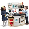 Step2 Great Gourmet Kids Kitchen Playset, Indoor/Outdoor Kitchenette, Interactive Play with Lights and Sounds, Made of Durable Plastic, Includes 33 Piece Toy Accessories, Toddlers 3+ Years Old, Tan(Tan)