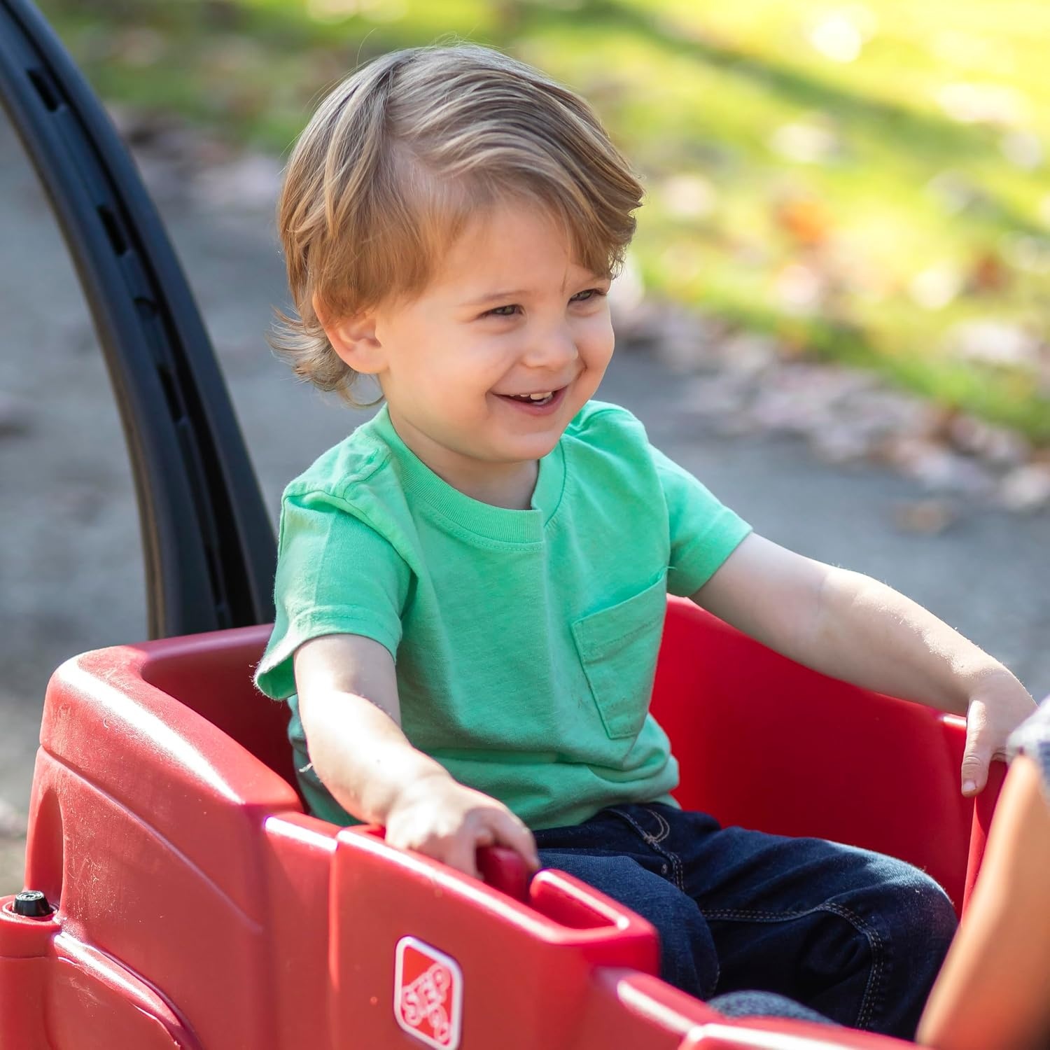 image:imageStep2 Neighborhood Wagon Kids Ride On Toy Stroller Substitute Includes Seat Belts Made of Durable Plastic Max Weight 75 lbs For Toddlers 155 Years Old RedRed